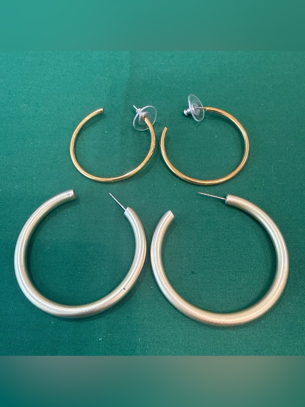 2 Pair Goldtone Hoop Earrings. 82D